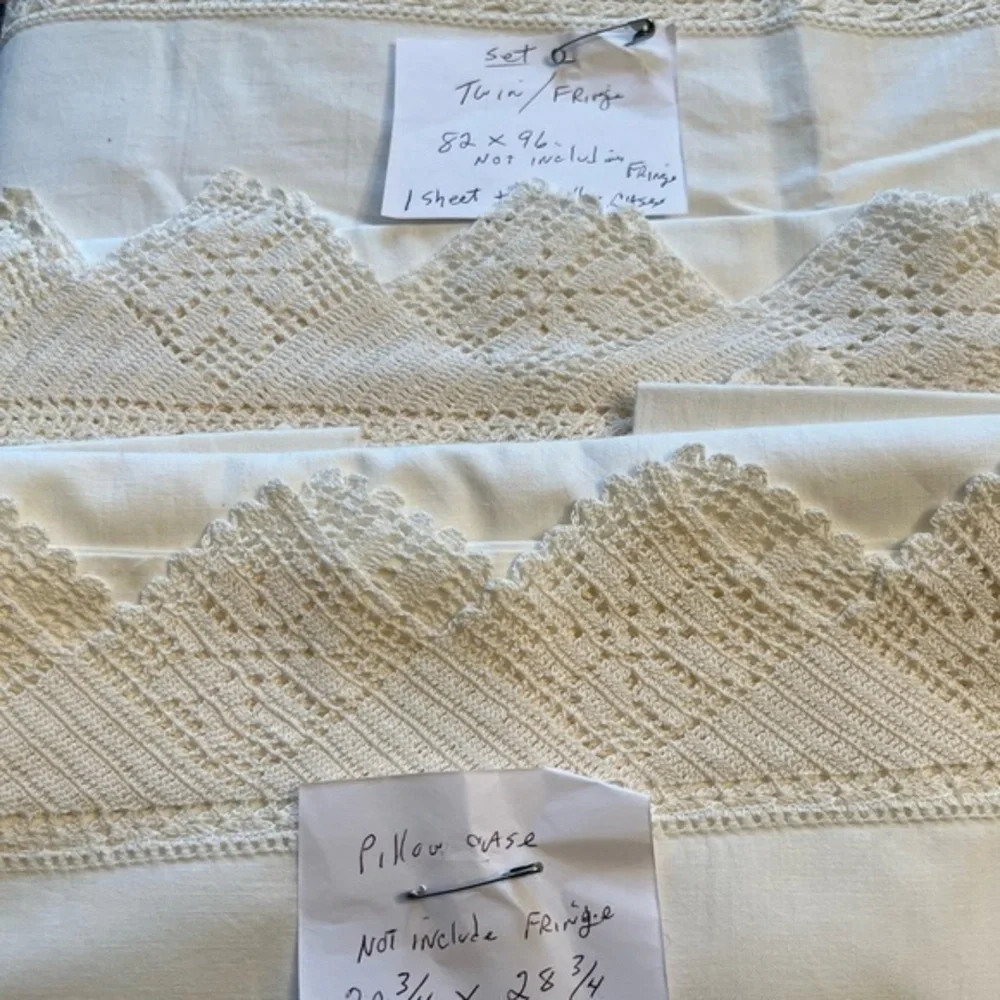 One vintage twin bed sheet w/two matching pillow cases. Never been used.